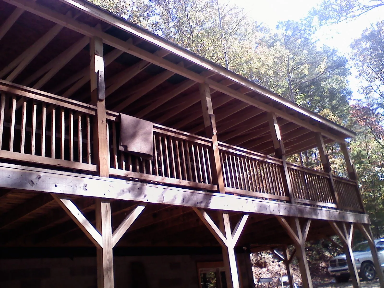 Timber framing under a new elevated porch and deck — Roof Leak Repair in Ottumwa by Roofing Brothers